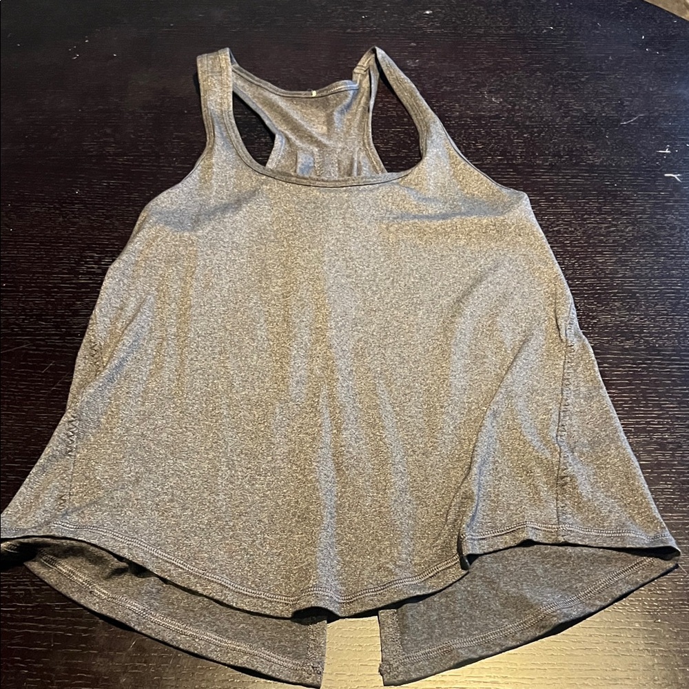 Lululemon racer back tank. No size tag. Measures S/M.